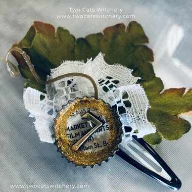 Handmade Victorian Inspired Hair Clip with White Lace, Green Leaves, and Newsprint Button with the Number Seven
